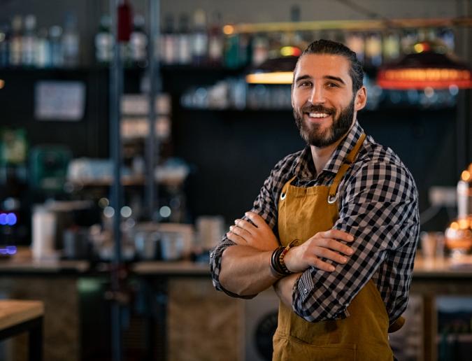 Server smiling in restaurant